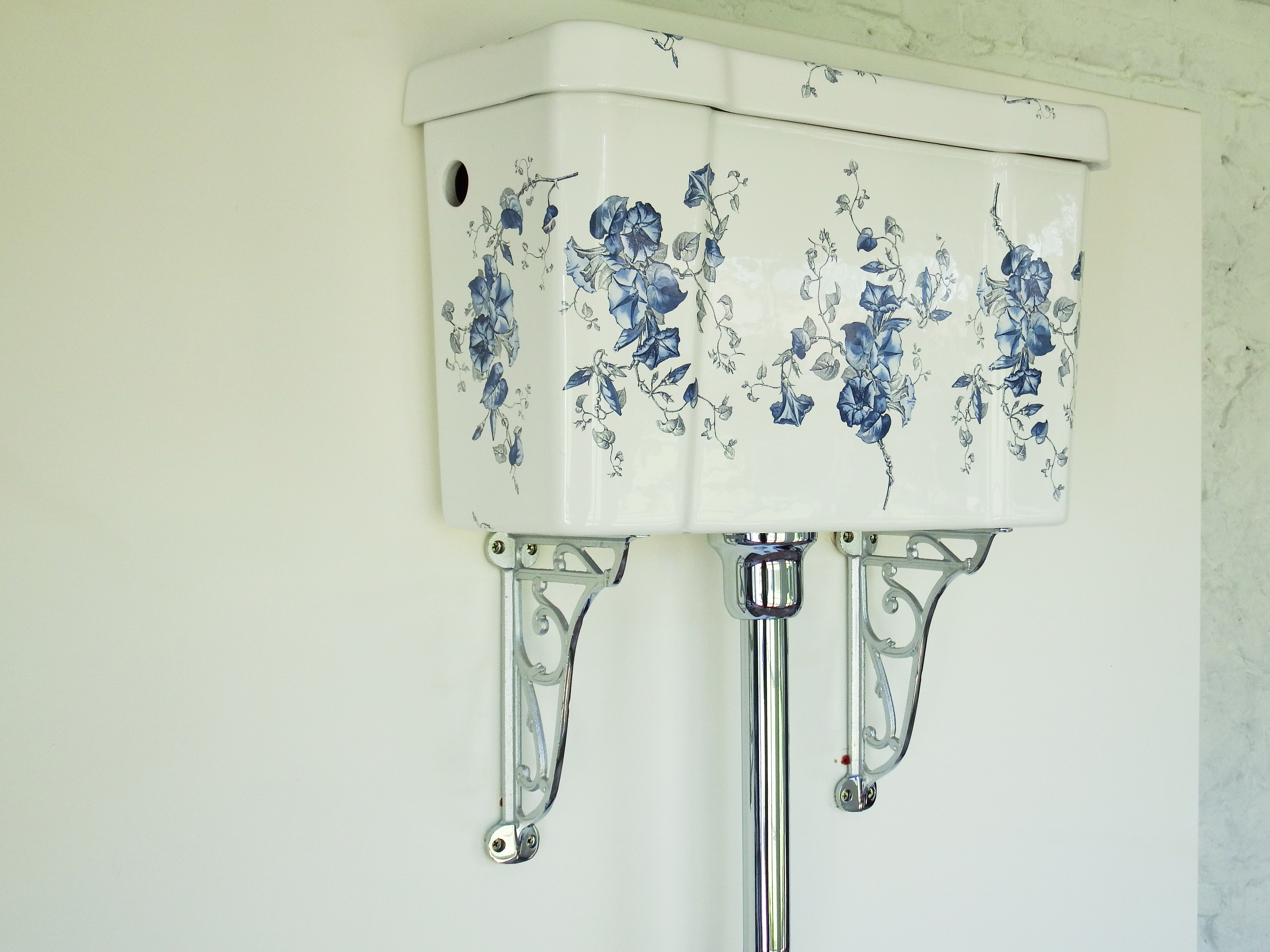Floral bathrooms Victorian-inspired blue and white cistern